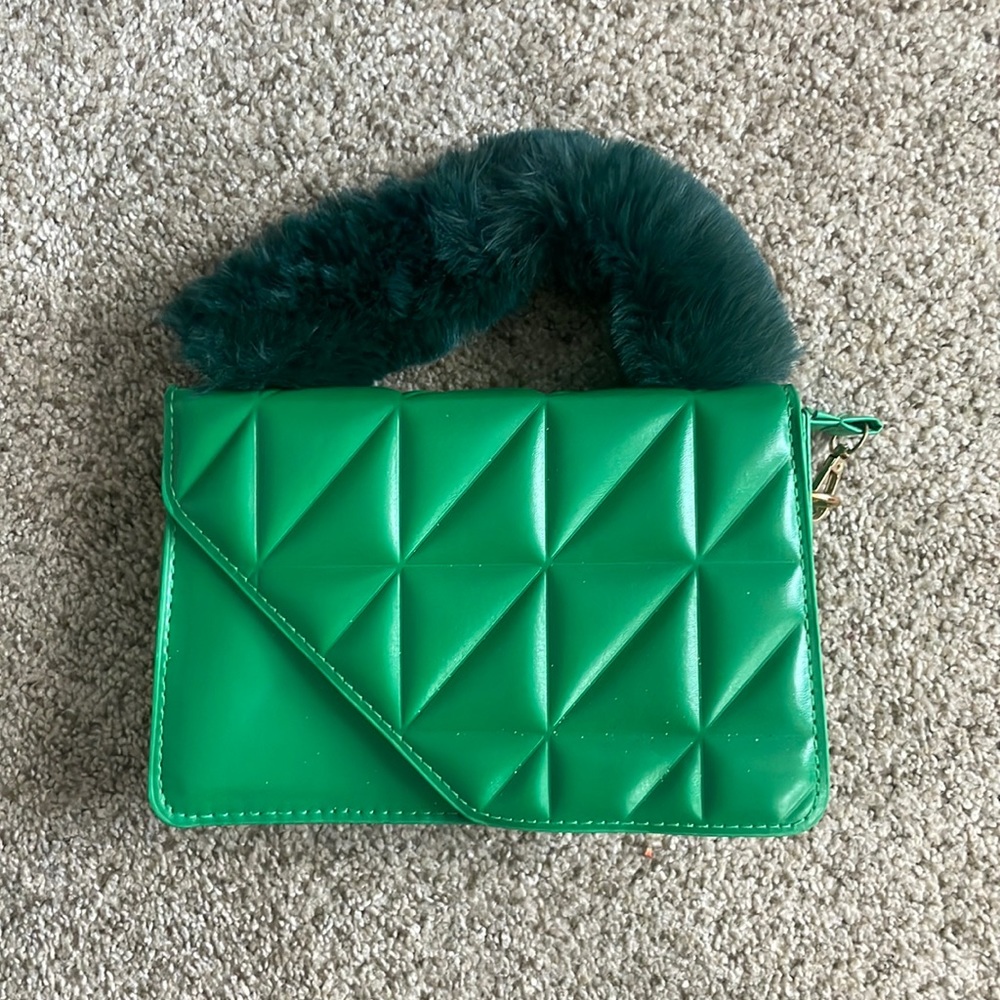 Green satchel with faux fur handle
